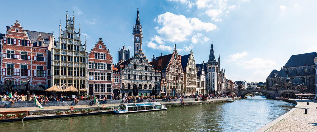 Medieval buildings lining a canal in Ghent, Belgium